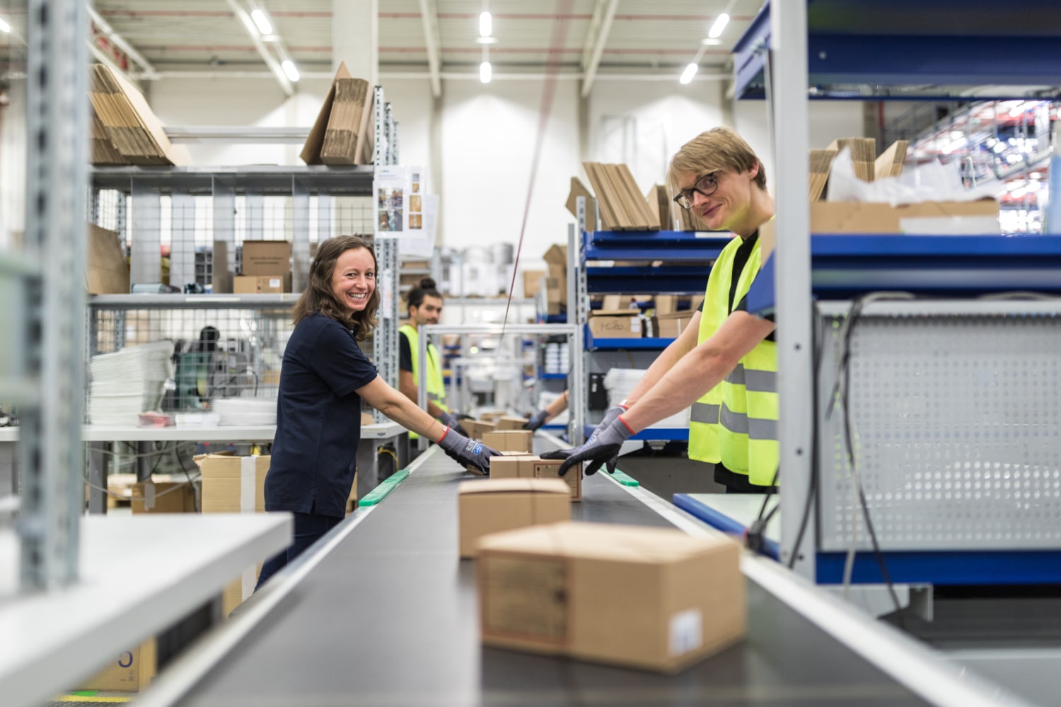 Co-packing crew working at a packaging station