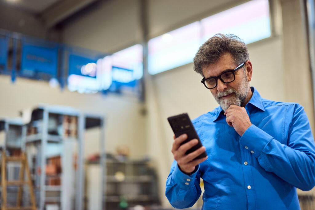 Manufacturing phone reading man
